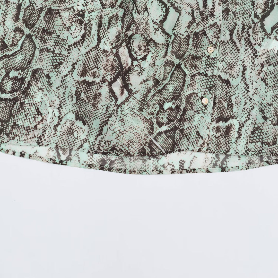 Women's blouse with waterfall shawl collar and snake print Mune Fashion