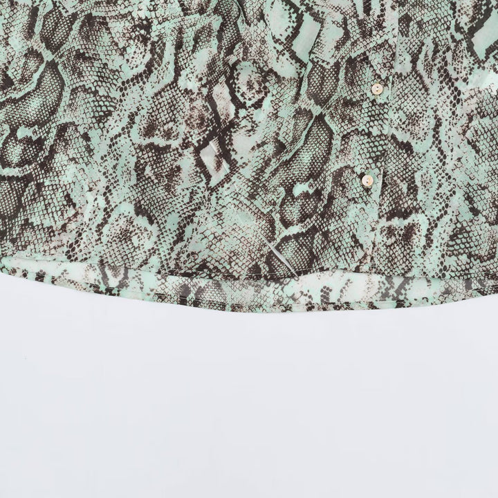 Women's blouse with waterfall shawl collar and snake print Mune Fashion