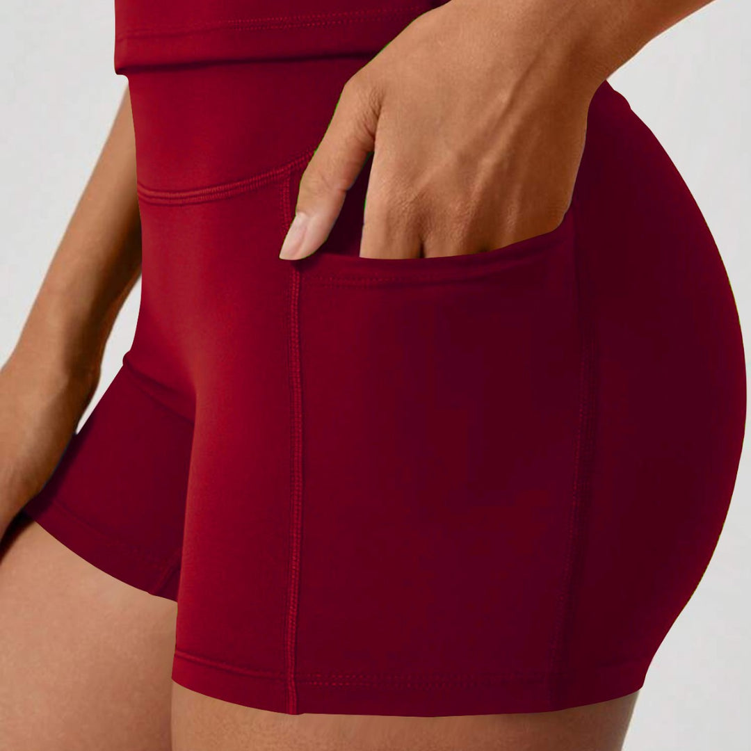 Women’s sporty compression shorts with practical side pockets Mune Fashion