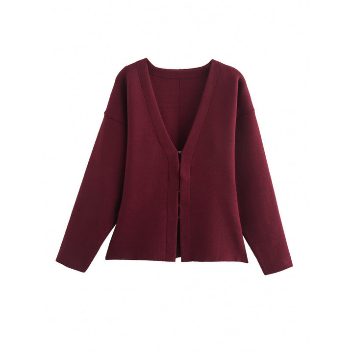 Women loosely fitted fine knit cardigan with deep V-neck and concealed button placket Mune Fashion