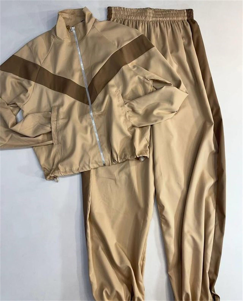 Women's satin track set with stand-up collar, chevron stripes and drawstring Mune Fashion