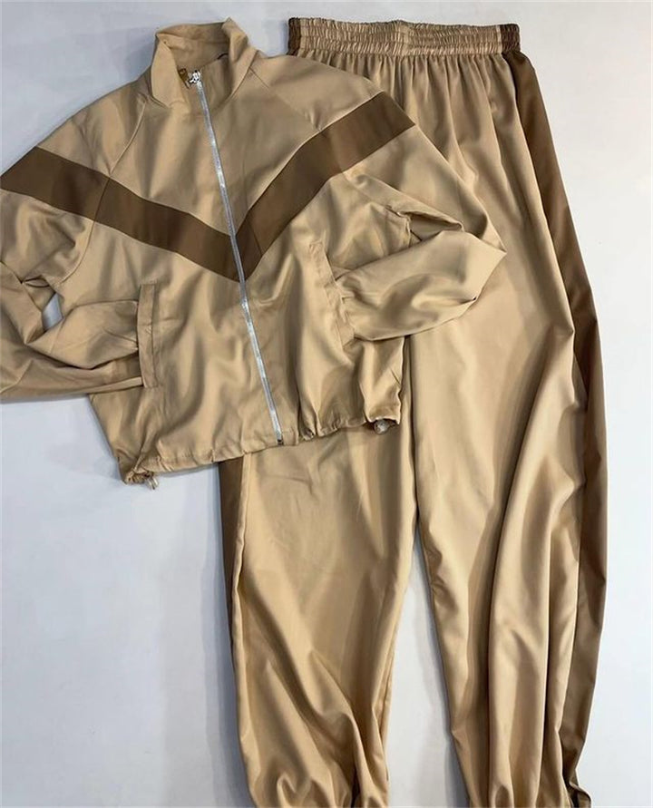 Women's satin track set with stand-up collar, chevron stripes and drawstring Mune Fashion