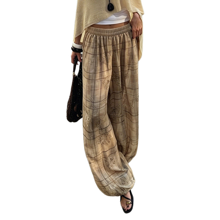 Women's loosely cut palazzo pants with elastic waistband and gathered leg cuffs Mune Fashion