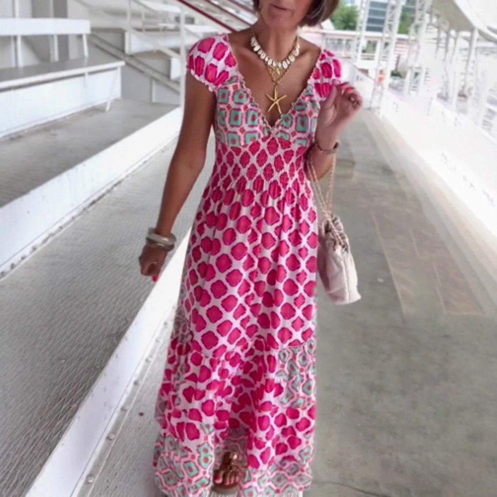 Women’s summer tiered dress with smocked top, V-neckline and puff sleeves Mune Fashion