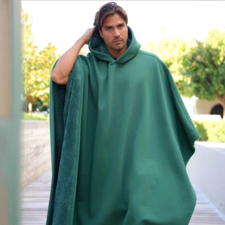 Unisex hooded poncho blanket with soft lining and generous oversized fit Mune Fashion