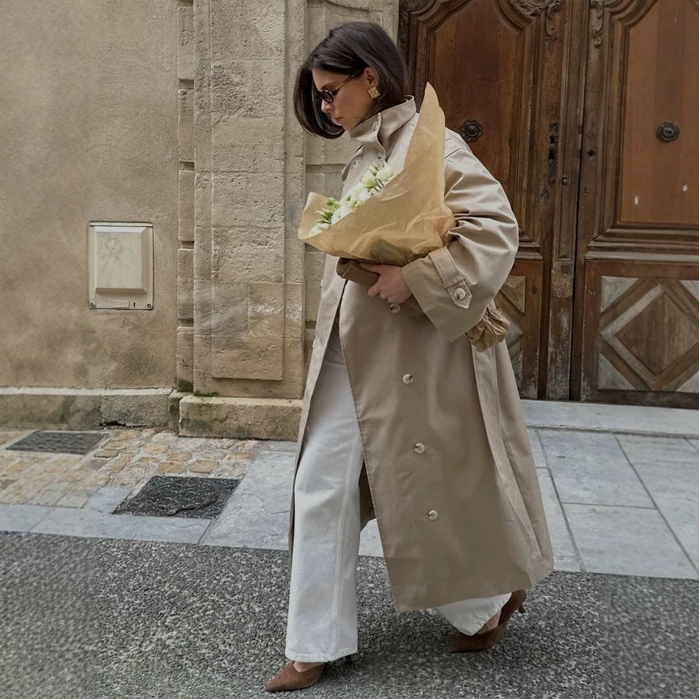 Women’s maxi trench coat with high stand-up collar, double-breasted button placket & waist belt Mune Fashion
