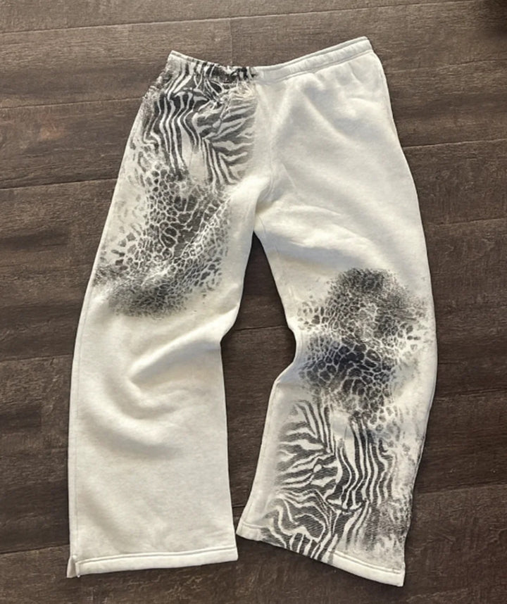 Women nan loose sweatpants with asymmetrical animal print, elastic comfort waistband and straight leg Mune Fashion
