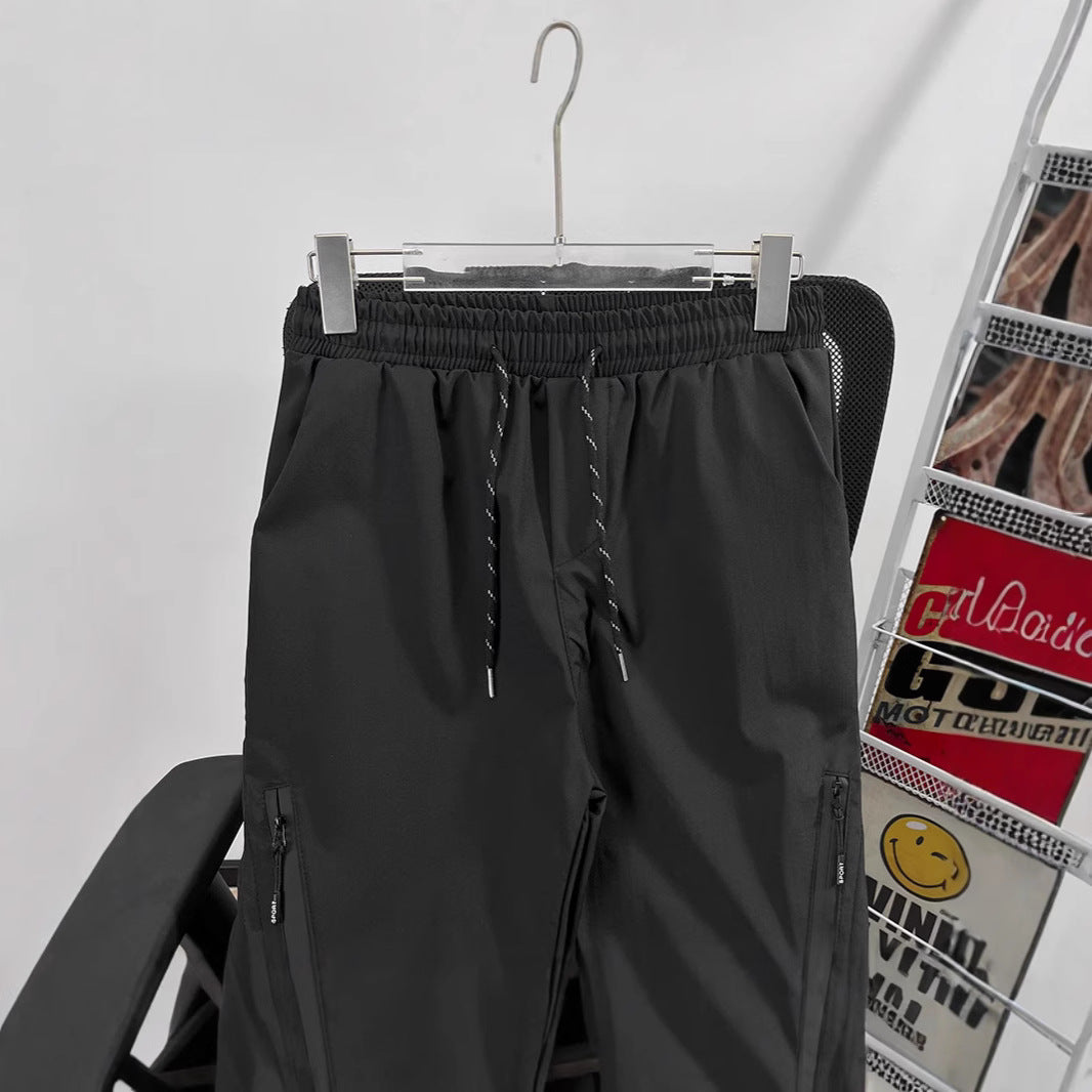 Unisex sporty jogging pants with adjustable waistband and side pockets Mune Fashion
