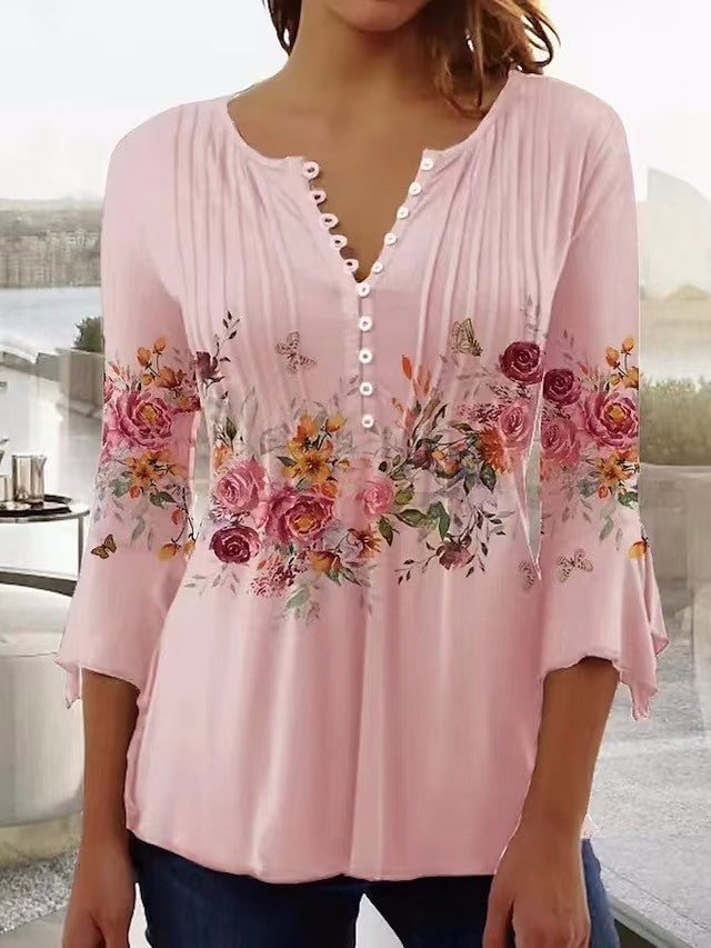 Ladies airy tunic blouse with watercolor floral border, knife pleats, and three-quarter sleeves Mune Fashion