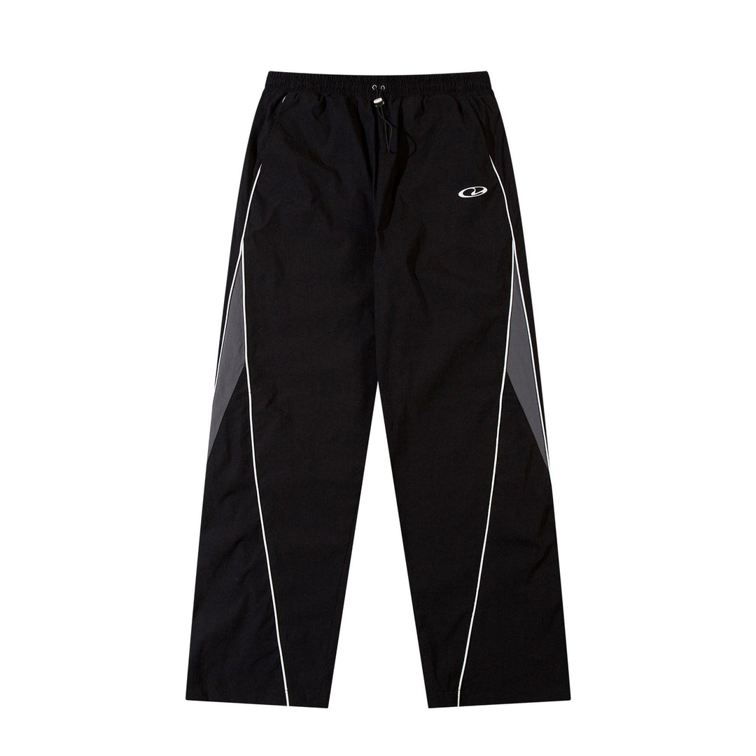 Men's sporty jogging pants with elastic waistband, side contrast piping, and straight cut Mune Fashion