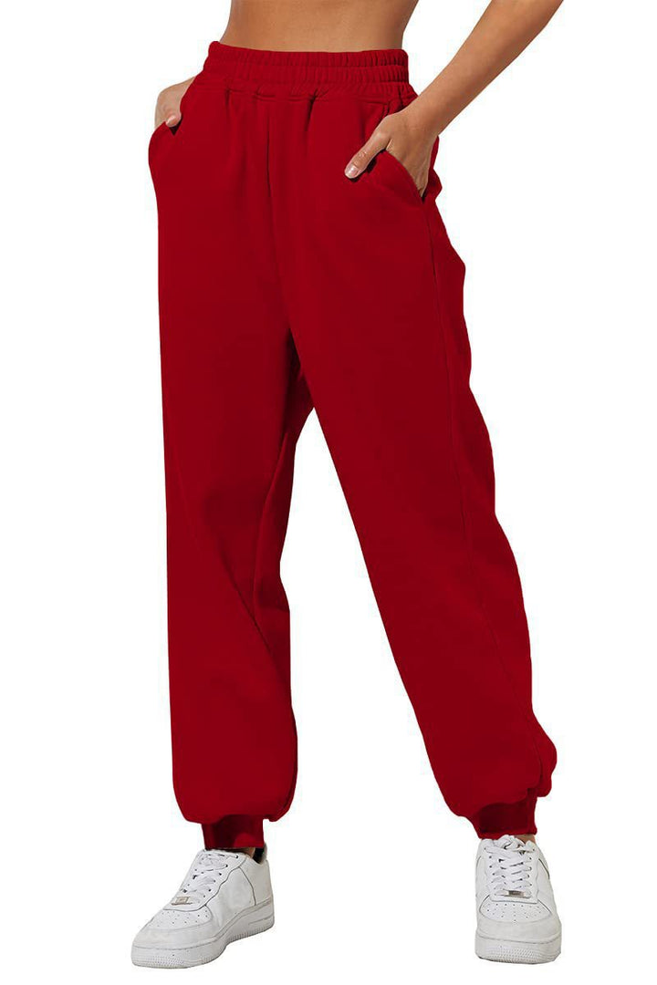Women's wide High-Waist jogging pants with soft creases, elastic comfort waistband, and ribbed ankle cuffs Mune Fashion