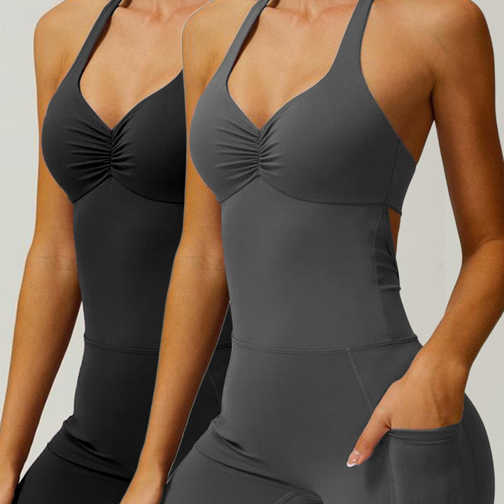 Women's sporty jumpsuit with figure-hugging cut and straps Mune Fashion