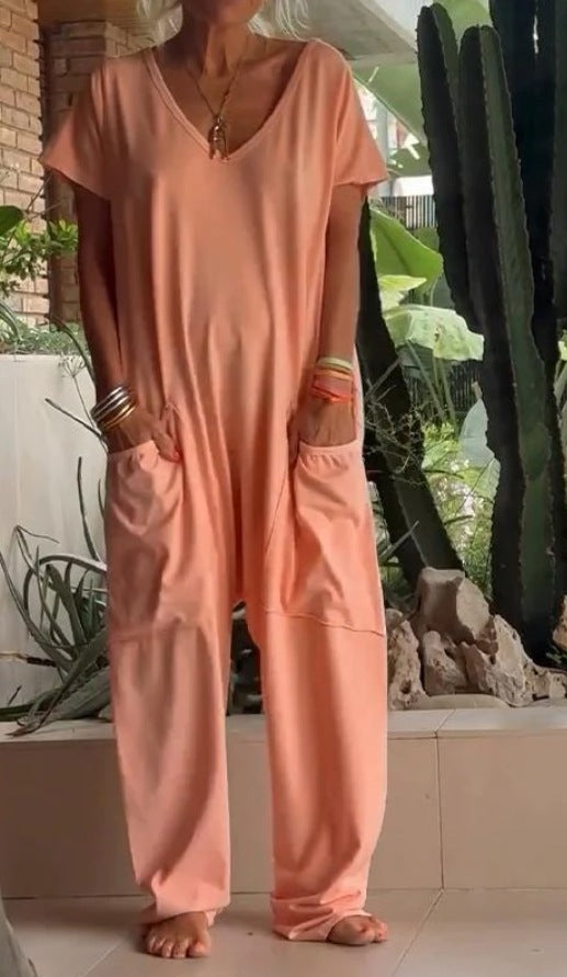 Women's comfortable oversized jumpsuit with V-neck, deep crotch and inset pockets Mune Fashion