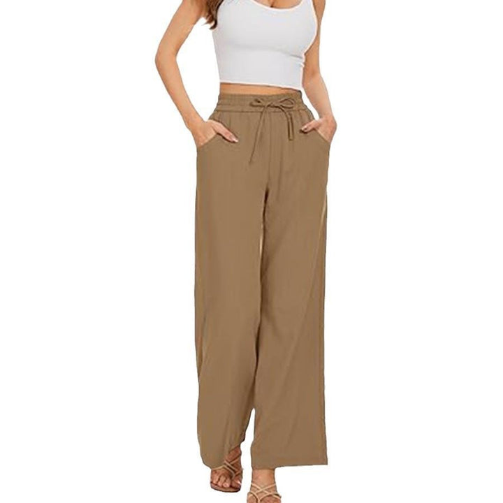 Women's wide linen pants with high elastic waistband, drawstring, and side pockets Mune Fashion