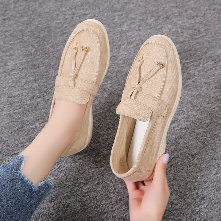 Women's casual suede look slippers with decorative cord, soft comfort insole, and flexible lightweight sole Mune Fashion