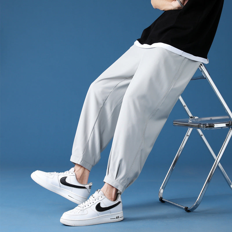 Men's wide technical jogging pants with elastic waistband, gathered leg cuffs, and breathable stretch material Mune Fashion