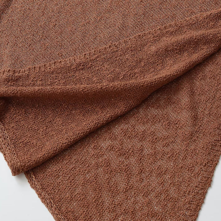 Women's lightweight knit poncho with asymmetrical hem and wide round neckline Mune Fashion