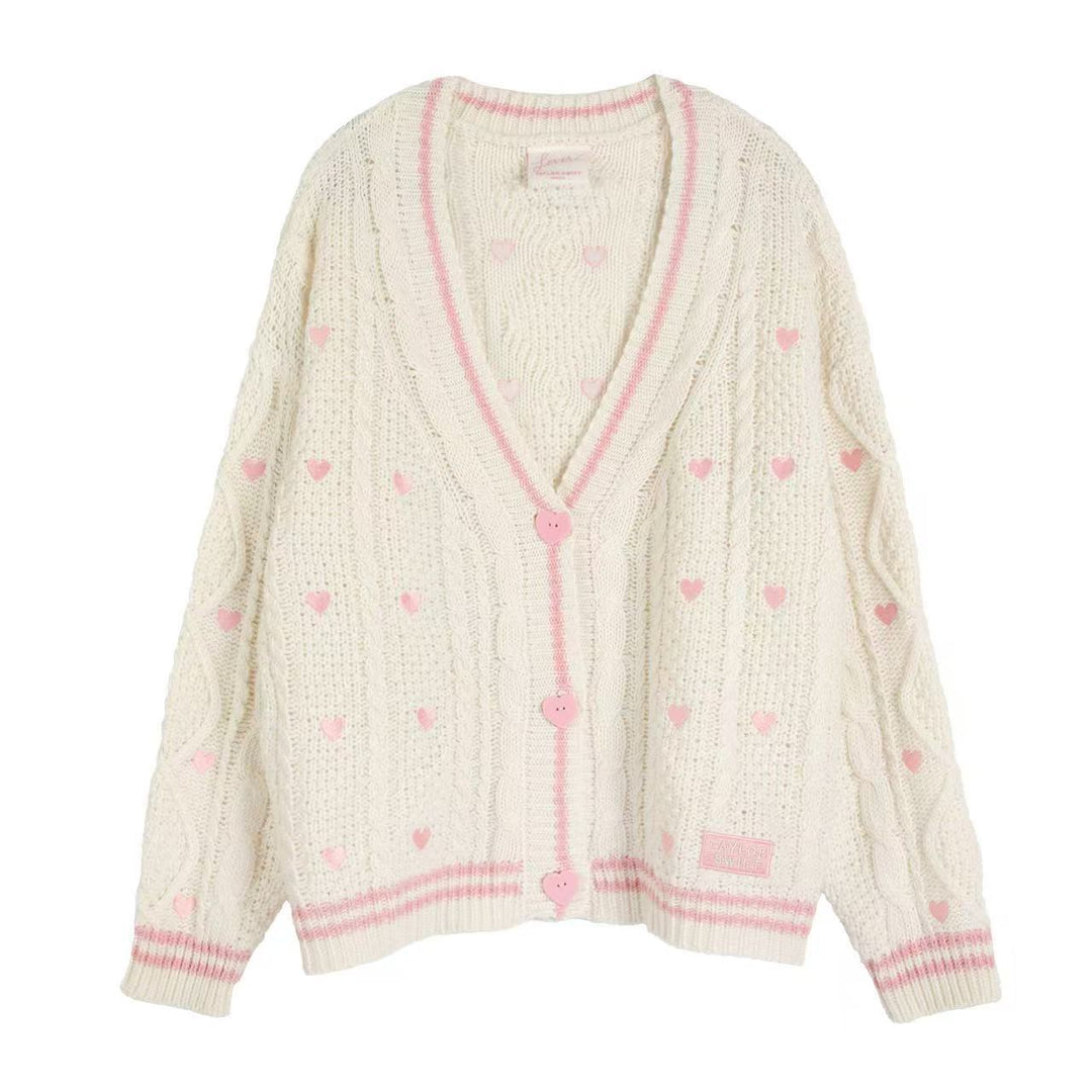 Women’s chunky knitted V-neck cardigan with heart appliqués and decorative heart buttons Mune Fashion