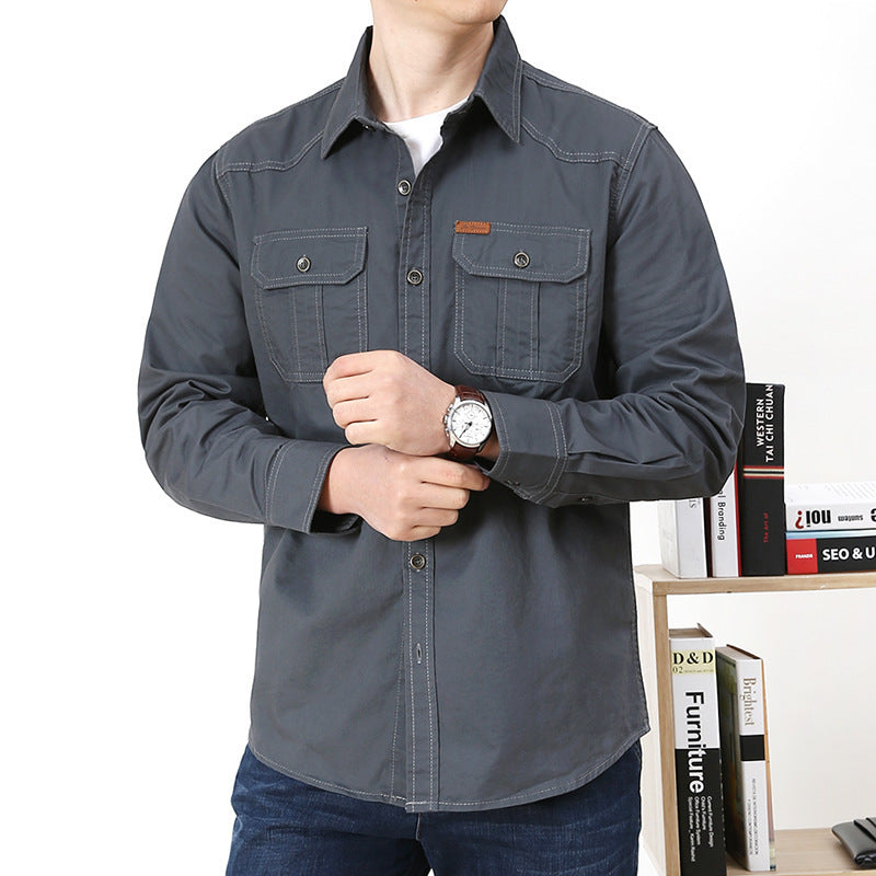 Men's casual canvas shirt with two patch breast pockets and reinforced seams.
