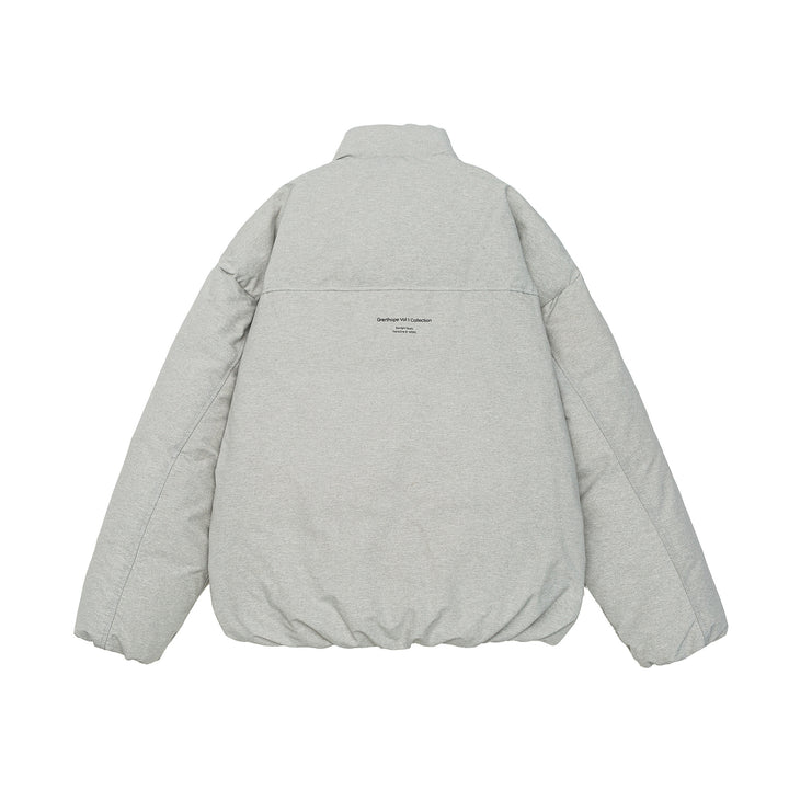 Women short cut oversized quilted jacket with high stand-up collar and concealed zipper Mune Fashion