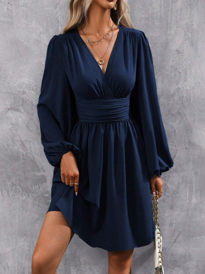 Women's wrap dress with stylish V-neck and voluminous sleeves Mune Fashion