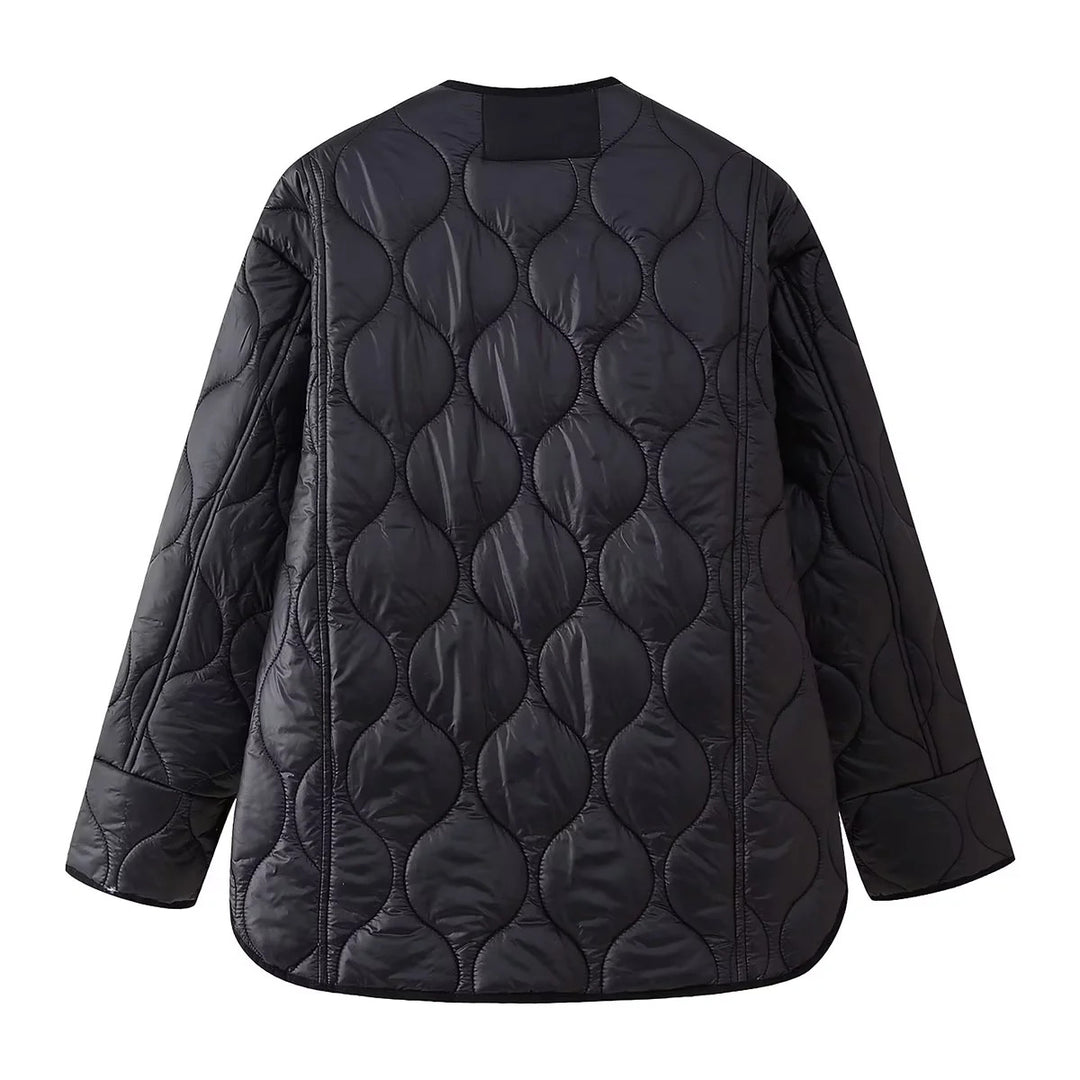 Women's light quilted transitional jacket with organic wave quilting, round neck, dropped shoulders, and flap pockets Mune Fashion