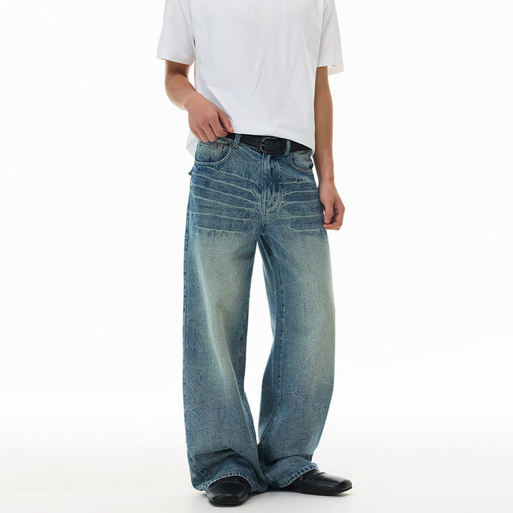 Men's ultra-wide cut denim baggy jeans with striking whisker accents and floor-length hem Mune Fashion