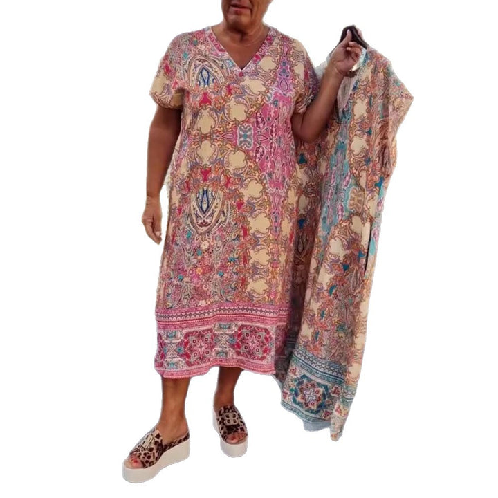 Women's airy V-neck dress in paisley print with side pockets and matching pareo Mune Fashion
