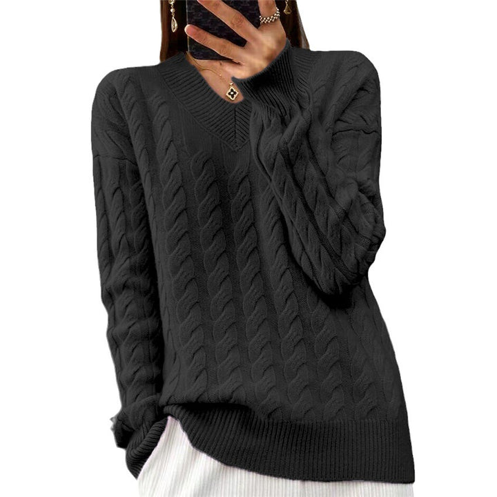 Women's soft draping cable knit sweater with V-neck, oversized cut and ribbed hem Mune Fashion