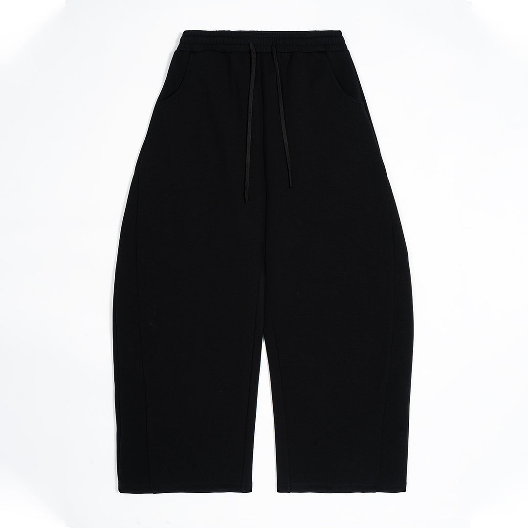 Women's loose-fitting jogging pants with elastic waist, drawstring, and side pockets Mune Fashion