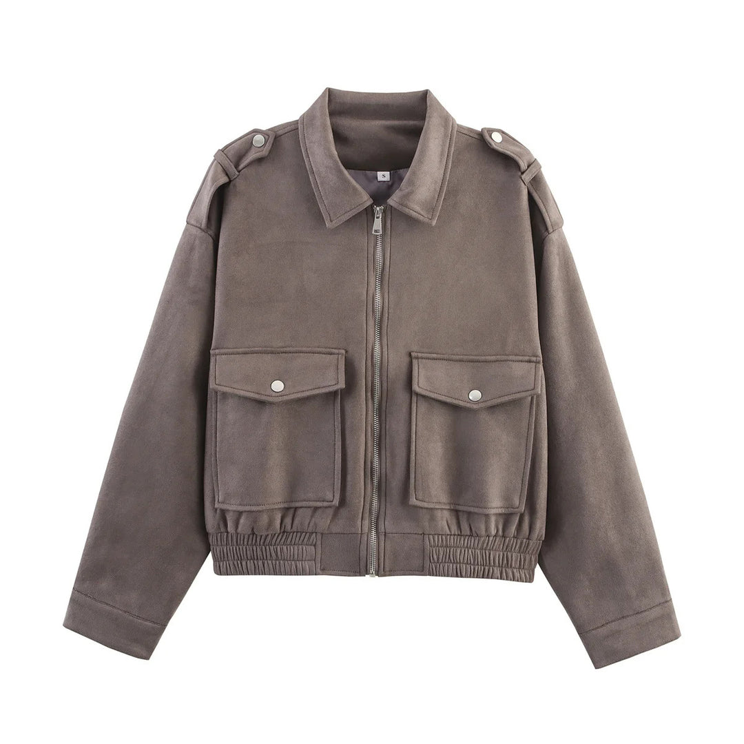 Women's cropped utility jacket with shoulder epaulettes, applied flap pockets, and elastic hem Mune Fashion