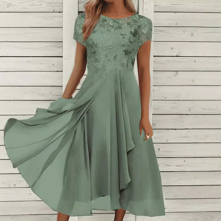 Women's flowing chiffon mid dress with floral embroidered top and asymmetrical tiered skirt Mune Fashion