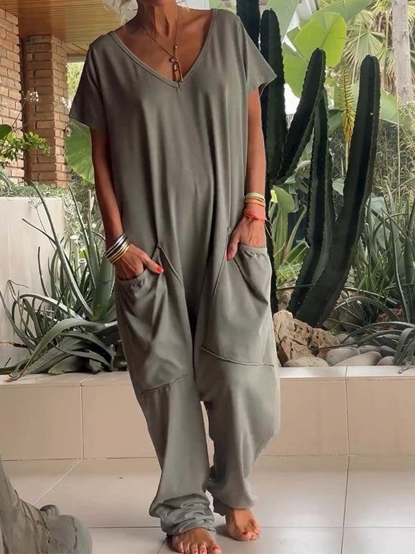 Women's comfortable oversized jumpsuit with V-neck, deep crotch and inset pockets Mune Fashion