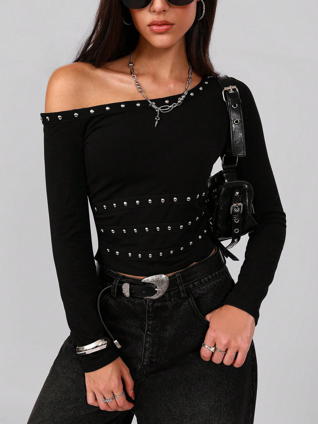 Women's asymmetrical off-shoulder long sleeve shirt with studded trim and fitted cut Mune Fashion