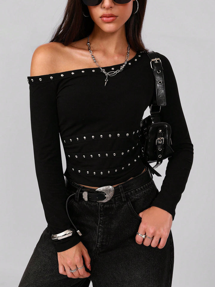 Women's asymmetrical off-shoulder long sleeve shirt with studded trim and fitted cut Mune Fashion
