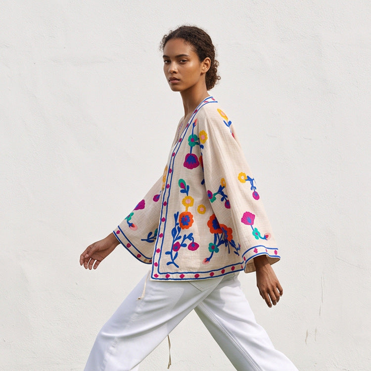 Women embroidered linen wrap jacket with folkloric flower appliqués Mune Fashion