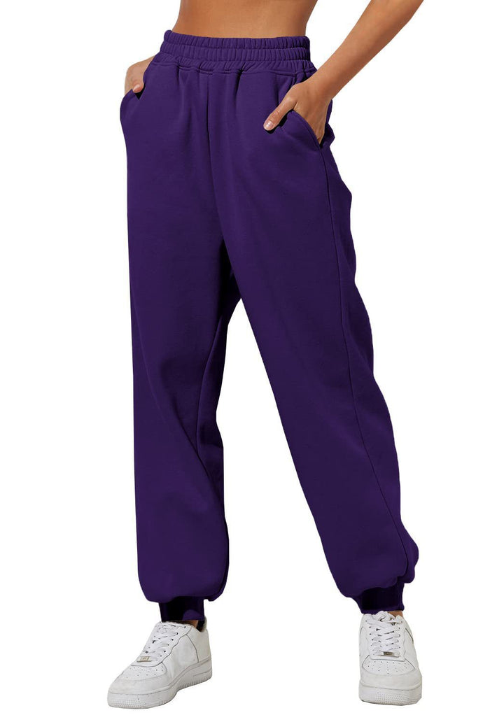Women's relaxed high-waist jogging pants with double-layer comfort waistband, side pockets, and gathered ankle cuffs Mune Fashion