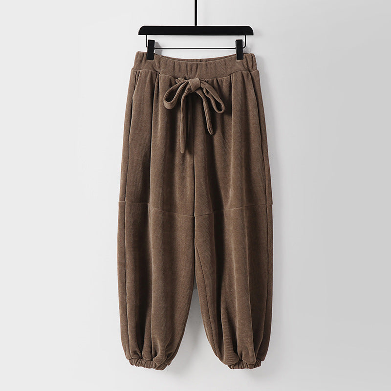 Women loose-fitting harem pants with elastic waistband and tie belt Mune Fashion