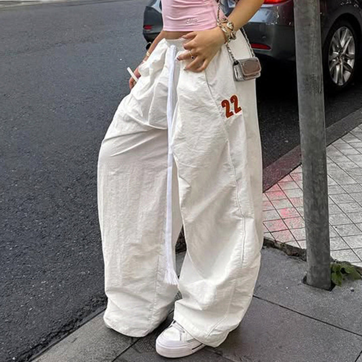 Ladies wide linen trousers with high elastic waistband, drawstring and casual palazzo cut Mune Fashion