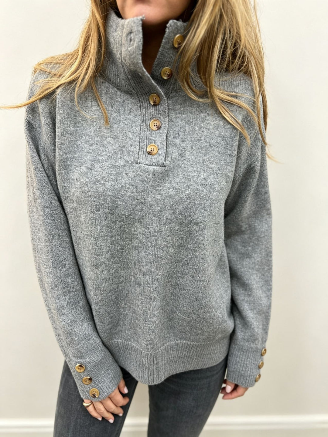 Women's knit sweater with high button collar, decorative front placket and decorative buttons Mune Fashion
