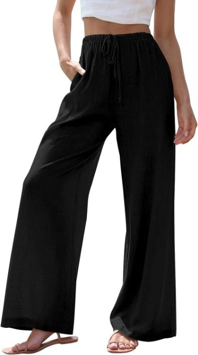 Women's wide linen pants with elastic waistband, drawstring, and side pockets Mune Fashion