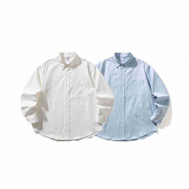 Unisex Oversized shirt with button-down collar, chest pocket and rounded hem Mune Fashion