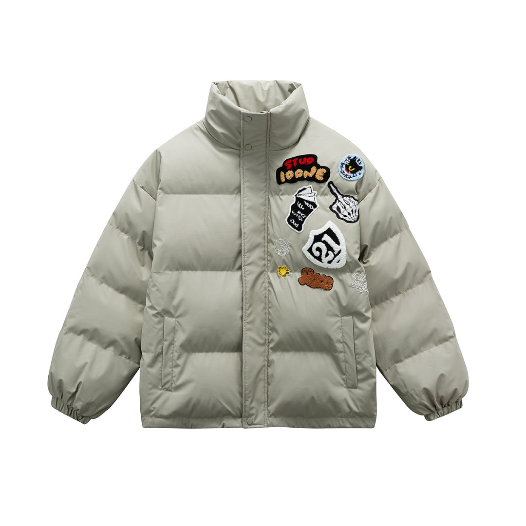 Unisex Boxy padded oversized puffer jacket with stand-up collar and statement patch details Mune Fashion