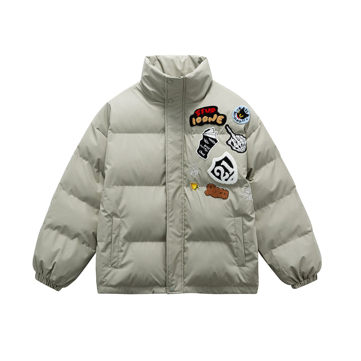 Unisex Boxy padded oversized puffer jacket with stand-up collar and statement patch details Mune Fashion