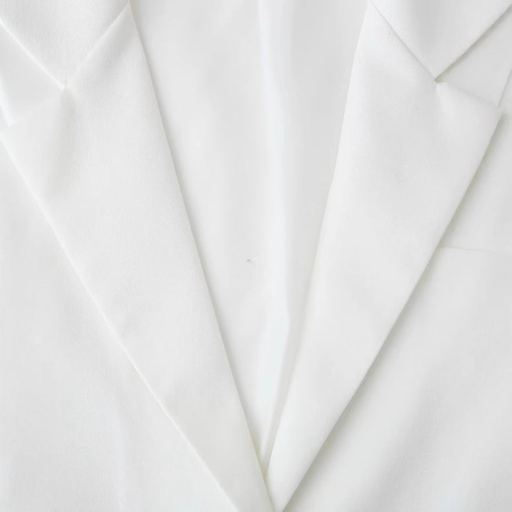 Women's tailored cropped vest with lapel collar and single-button closure Mune Fashion