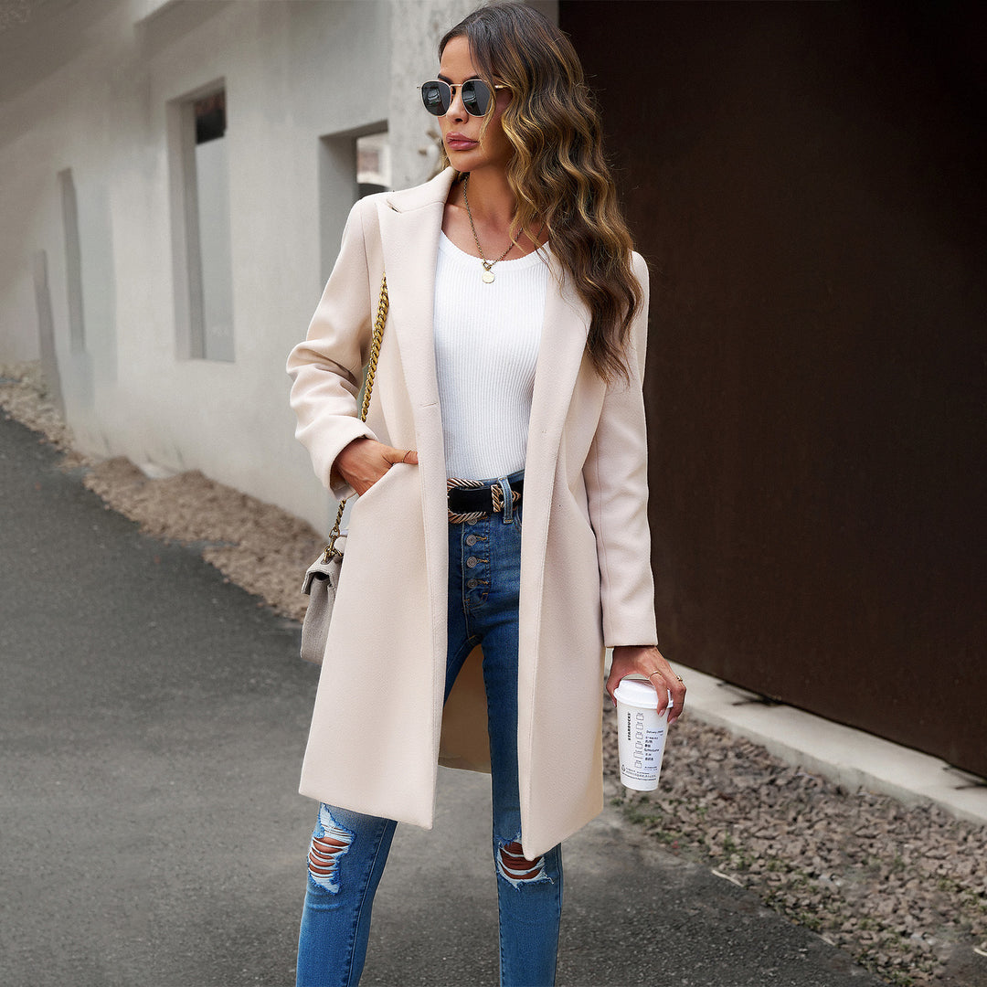 Women's longer tailored wool blend coat with lapel collar, concealed button placket and side pockets Mune Fashion