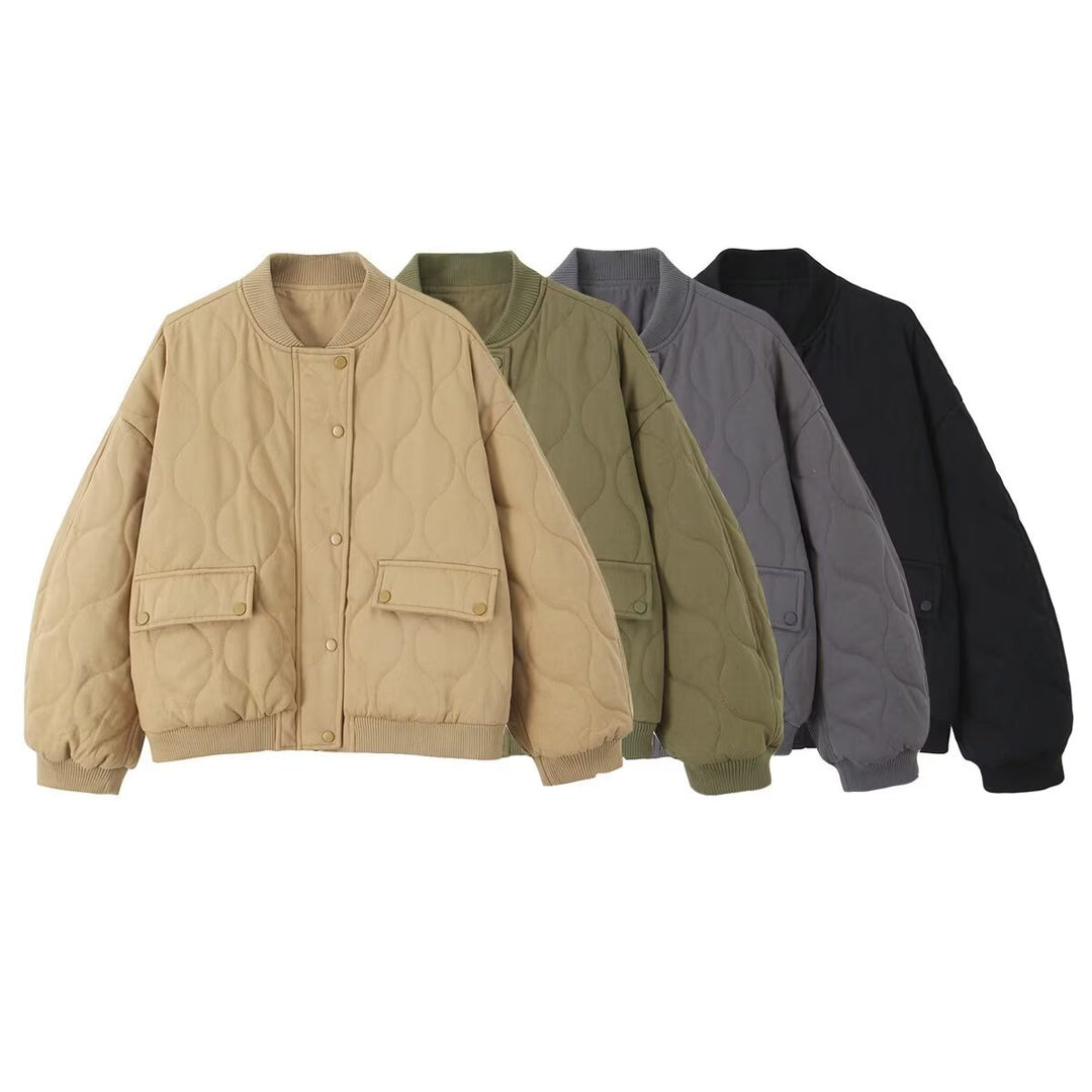 Women's quilted bomber jacket with oversized silhouette, ribbed cuffs, and flap pockets Mune Fashion