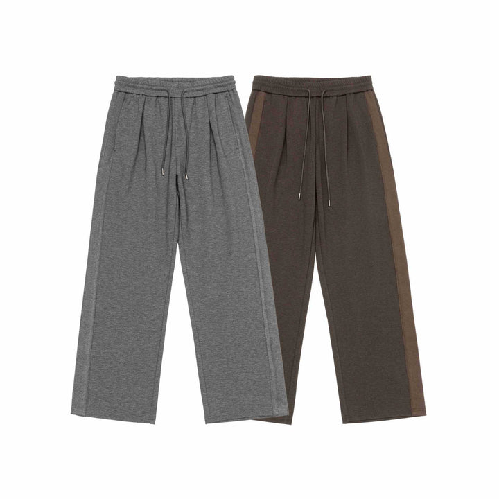 Women's wide joggers made of cotton blend with contrast side stripes and drawstring Mune Fashion