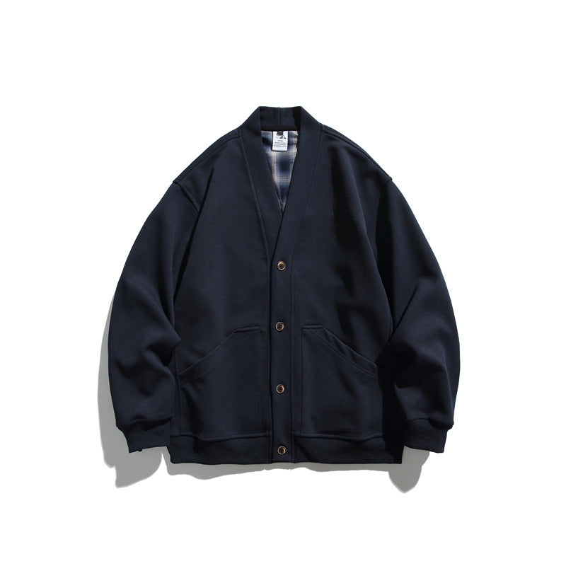 Unisex Oversized cardigan jacket made of heavyweight French terry with V-neck and patch pockets