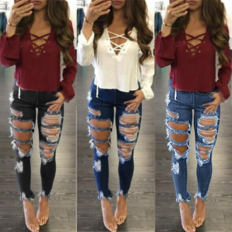 Ladies extreme ripped high-waist skinny jeans with raw fringe waistband Mune Fashion